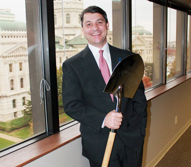 Indiana Secretary of Commerce Victor P. Smith holds the Silver Shovel in the 5+ to 10 million population category.