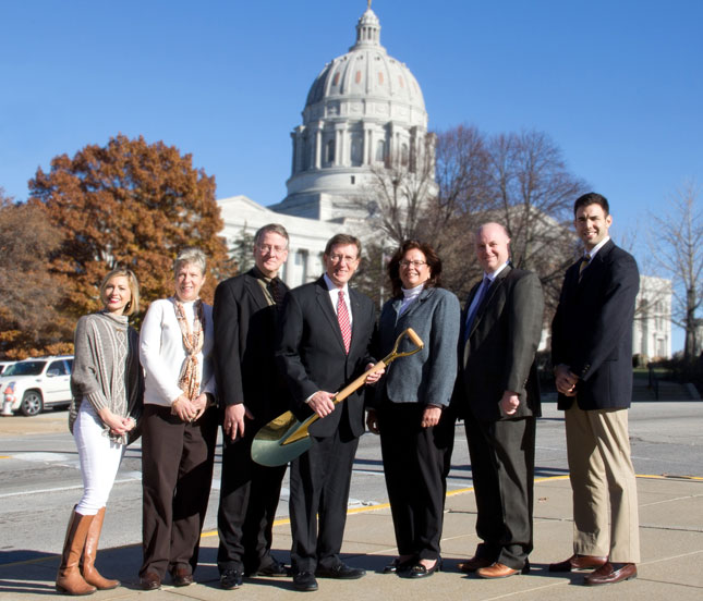 Figure 8: Director Mike Downing of the Missouri Department of Economic Development holds the state’s Gold Shovel award. He is pictured with team members, who helped the state earn this award.