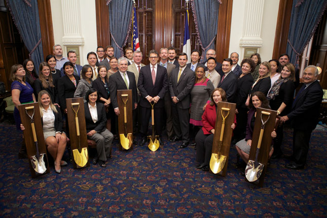 Figure 7: Texas Governor Rick Perry is joined by members of his office’s Economic Development and Tourism department to celebrate the state’s latest Gold Shovel award.