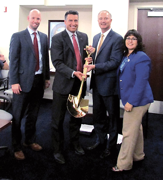Figure 7: Jonas Peterson,CEO of the Las Vegas Global Economic Alliance;Governor Brian Sandoval; GOED Director Steve Hill; and Assemblywoman Irene Bustamante-Adams shown with Nevada’s first-ever Gold Shovel award.