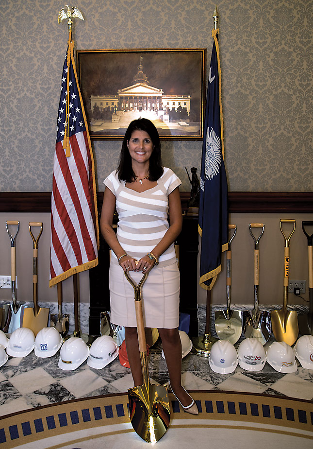 Figure 1: South Carolina Governor Nikki Haley poses with the Gold Shovel award.
