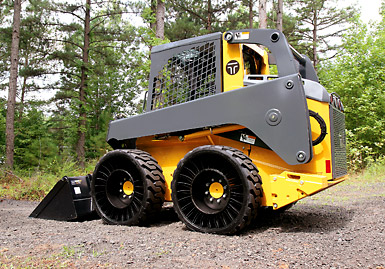 MICHELIN® X® TWEEL® SSL ALL-TERRAIN tire on a skid steer loader